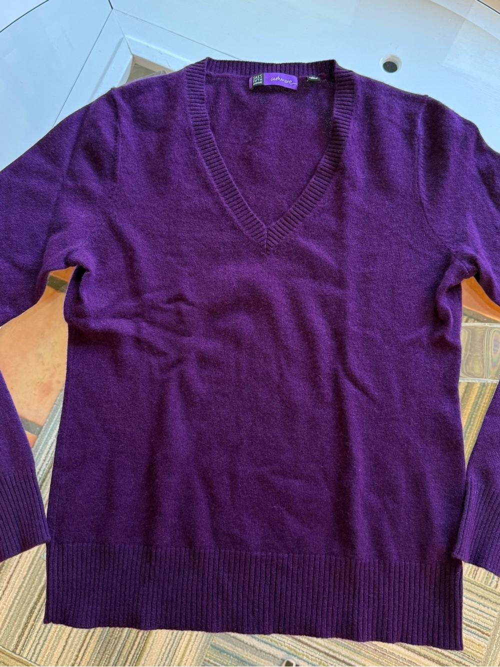 Purple Cashmere Women’s Sweater; Saks Fifth Ave.